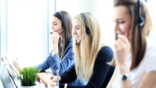Internal CATI team talking to clients through headphones.